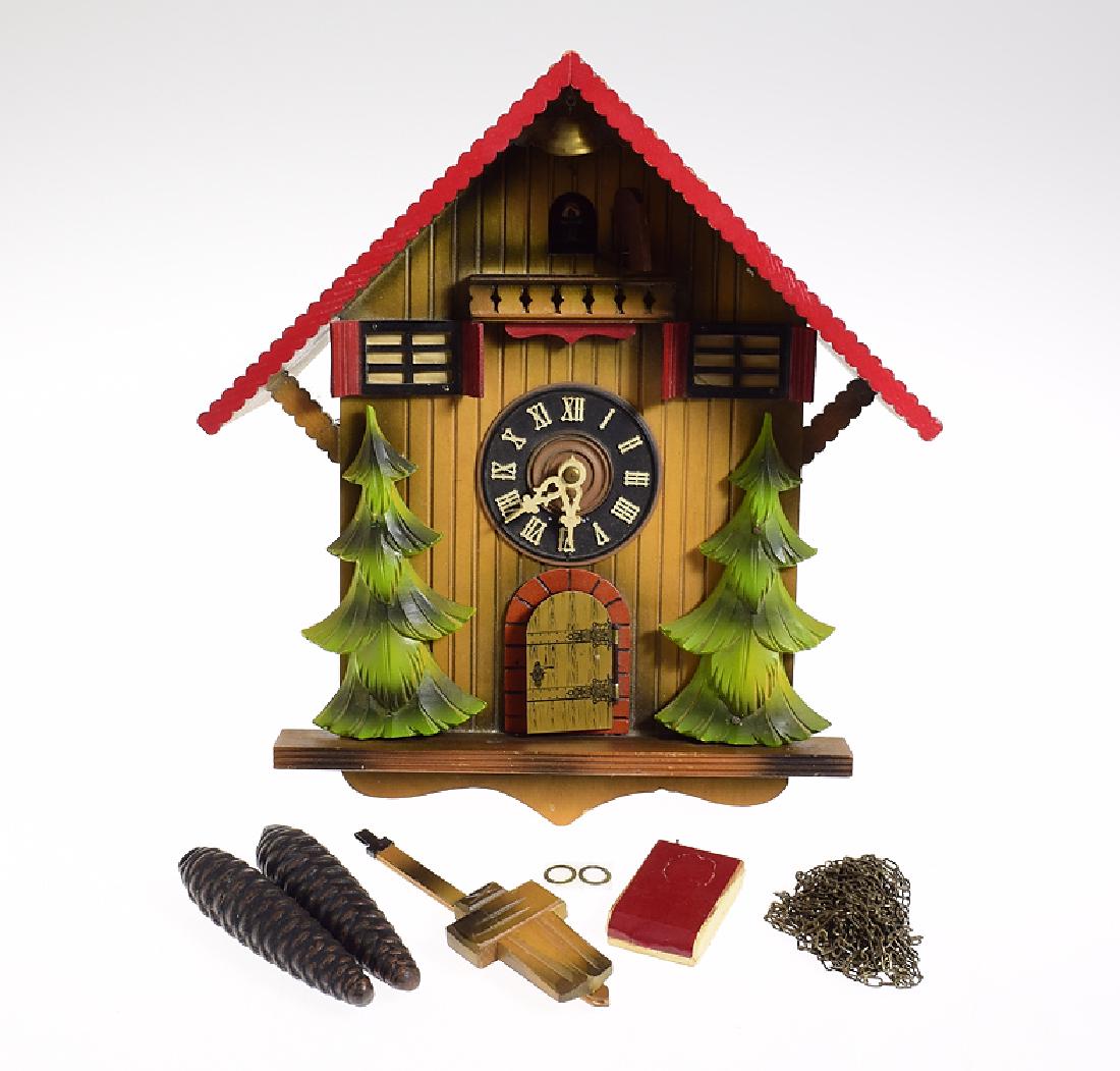 Black Forest Clock VINTAGE CUCKOO CLOCK LIMITED: Details: Black Forest Clock VINTAGE CUCKOO CLOCK LIMITED PRODUCTION BELL RINGER c1975 German Collectible Clock 2 Doors Cuckoo & Man Pulling BellMaker: UnknownHistory of Maker: N/ACountry of Origin: