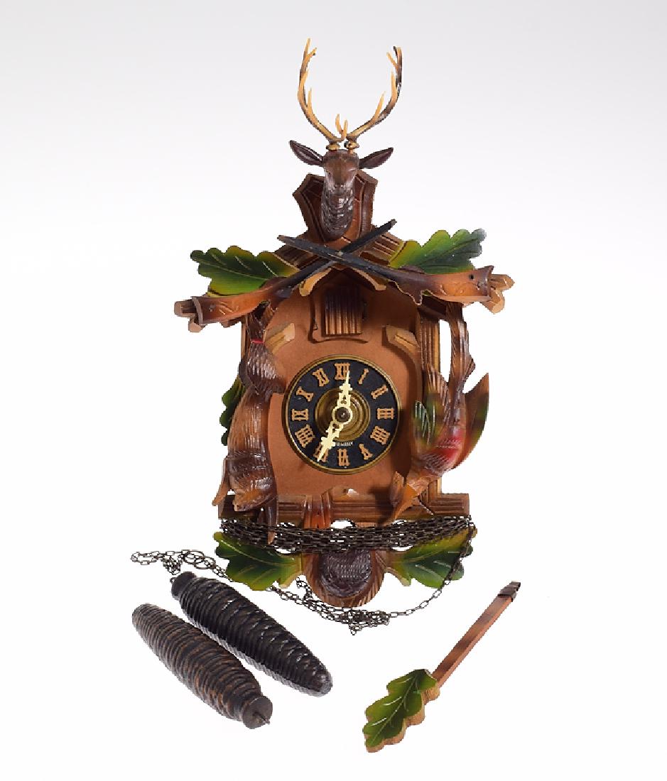 Hagos Hrastnig Clock CUCKOO CLOCK VINTAGE GERMAN BLACK: Details: Hagos Hrastnig Clock CUCKOO CLOCK VINTAGE GERMAN BLACK FOREST HUNTER CLOCK c1955 Small Scale Airbrushed Decorative Collectible Maker: Hagos Hrastnig K.G. History of Maker: Hagos Hrastnig K.G.