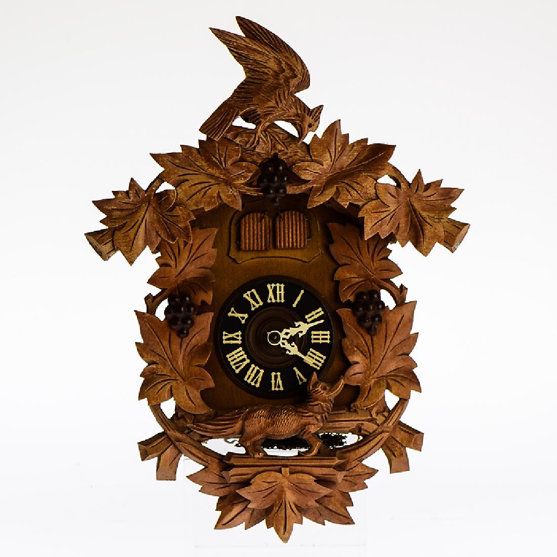 German Cuckoo Clock BLACK FOREST FOX & BIRD MOTIF: Details: German Cuckoo Clock BLACK FOREST FOX & BIRD MOTIF VINTAGE HAND CARVED CLOCK c1948 Musical Cuckoo Clock Long Playing Music Box Maker: Unclear History of Maker: N/A Country of Origin: Germa