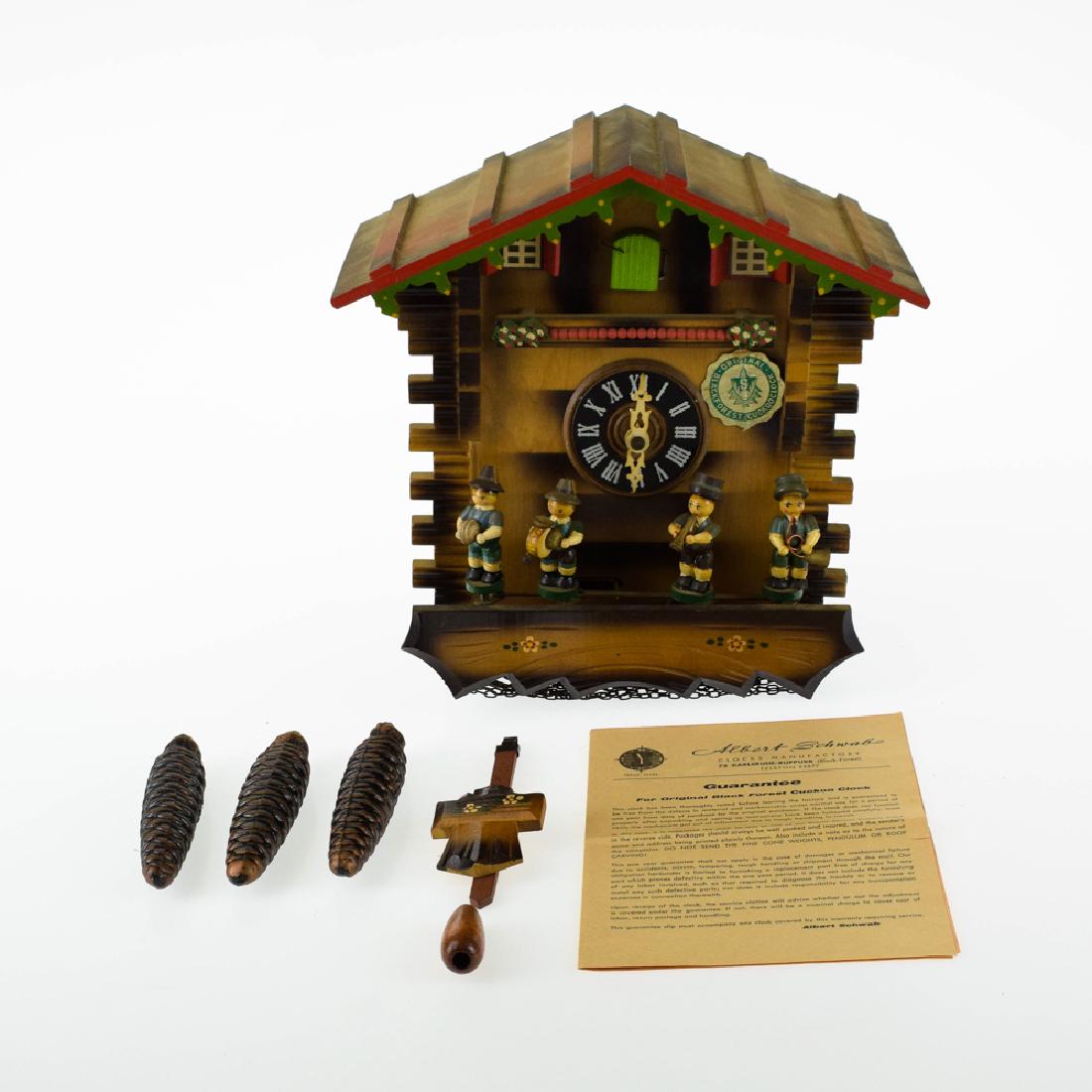 Vintage Cuckoo Clock BLACK FOREST CLOCK ALBERT SCHWAB: Details: Vintage Cuckoo Clock BLACK FOREST CLOCK ALBERT SCHWAB EXCELLENT CONDITION OOMPAH BAND c1965 Regula Movement German Collectible Maker: Albert Schwab with Regula movementHistory of Maker: Regu