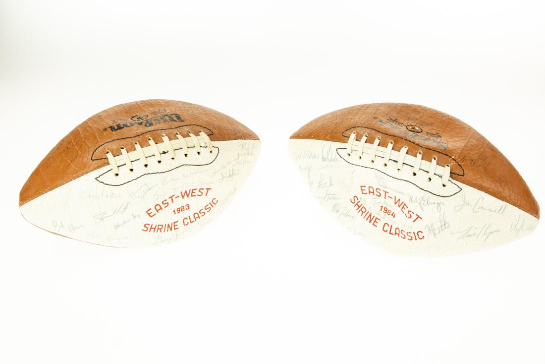 Collectible Game Balls SIGNED 1983 AND 1984 EAST WEST: Collectible Game Balls SIGNED 1983 AND 1984 EAST WEST SHRINE GAME FOOTBALLS John Elway Denver Broncos Quarterback Early Signature Bob Ataris Mark Duda Tim Joiner Bill Brasher Darryl Clark Tim Agee Kei