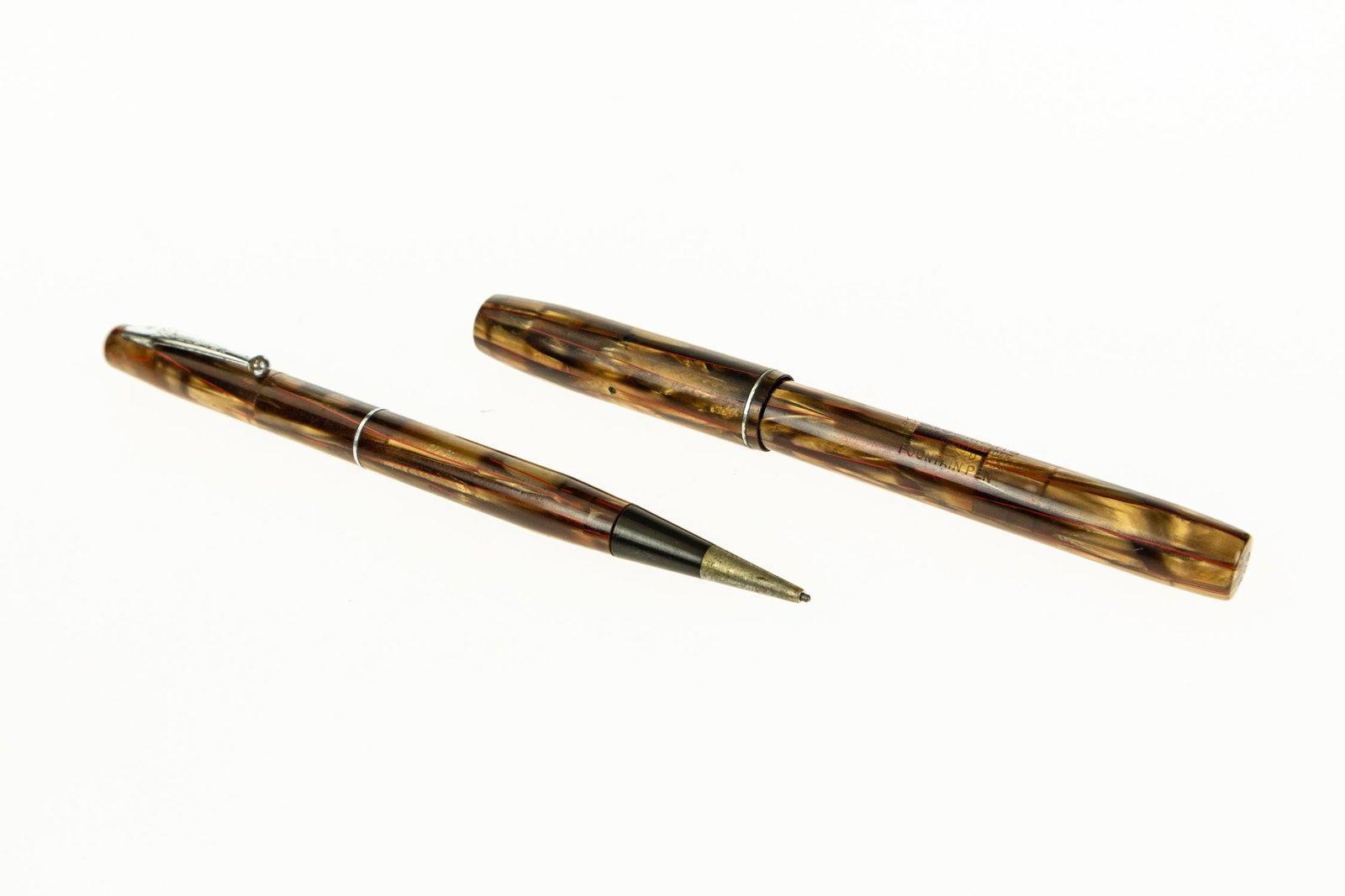 2Pcs ANTIQUE WATERMAN FOUNTAIN PEN & PENCIL SET: 2Pcs ANTIQUE WATERMAN FOUNTAIN PEN & PENCIL SET c1930 Model 301 Gold Marbled Celluloid Linear Crimson Highlights Collectible Writing Implement Details: This lot consists of a c1930 decorative anti