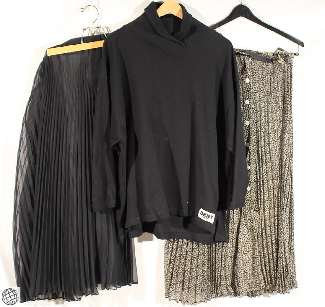 3PCS LOT Set DKNY DONNA KARAN Black Ivory SKIRTS: Details: This lightly worn, pre owned 3PCS set designed by Donna Karan DKNY, consists of a black sweater or pullover in a cotton jersey blend and two sheer pleated skirts with mother of pearl button