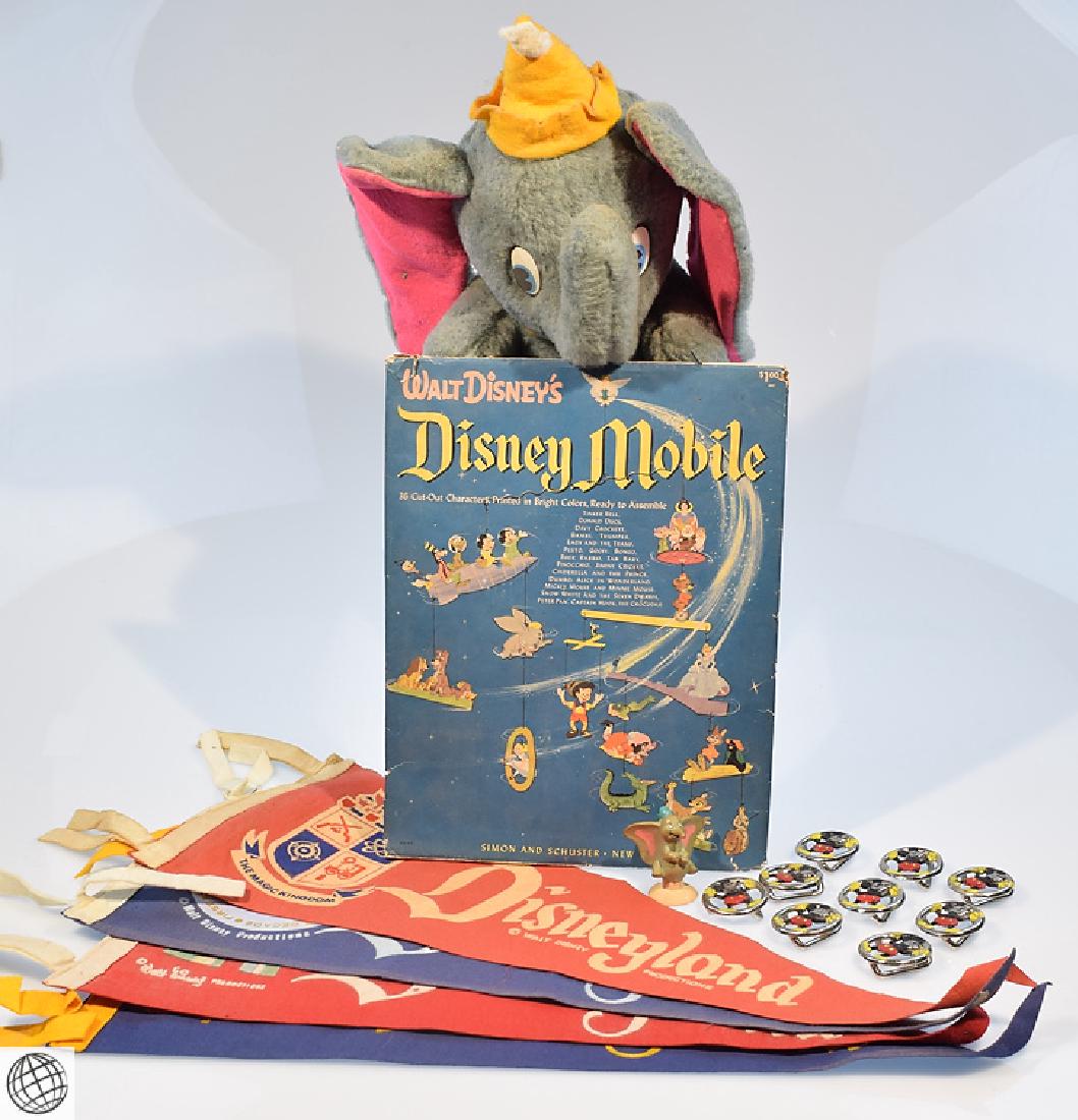 16Pcs Dumbo Mickey Mouse VINTAGE ANTIQUE WALT DISNEY: Details: This lot of vintage and antique Disney toys and memorabilia includes a Dumbo doll and figurine, a mobile, four Disneyland pennants, and nine molded Mickey Mouse belt buckles.Please attend ou