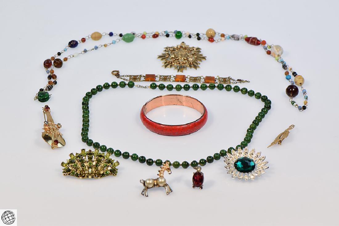 11Pcs Antique and Vintage Costume Jewelry Midcentury: Details: This 11 piece antique and costume jewelry lot contains Edwardian through Midcentury pieces, including some marked Hollycraft, Renoir Matisse, Accessocraft, Venetian, and some bakelite and gol