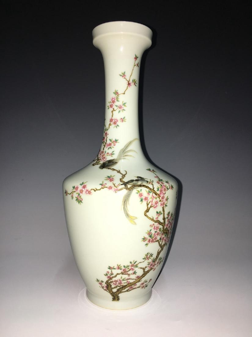 A FAMILLE ROSE INSCRIBED BOTTLE VASE, YONGZHENG MARK: Thick rim at mouth, long neck on bottle formed body, high sides tapering to flat base, painted decoration of birds on blossoming branches, with calligraphy inscription and Yongzheng mark on base. Widt