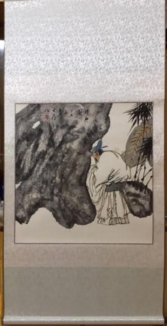 LIU DAWEI, CALLIGRAPHY COUPLET, A PAIR OF HANGING: China, mounted painting, colored ink on paper, scene representing a male figure in heavy white robes, praying at the bottom of a rocky landscape, with calligraphy and red marks.68cm x 69cm