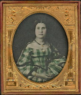 DREAMY YOUNG WOMAN IN A GREEN DRESS WITH A GOLD NUGGET: Sixth plate ambrotype.Dreamy young woman in a green dress, wears a large cameo, a gold nugget on her necklace, and a gold bracelet. Notice the lively mat. Full case.This is a generous donation from Da