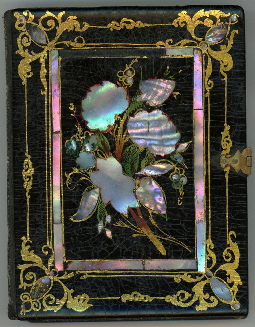 LOVELY WOMAN, LOVELY CASE BY JACOBS, NEW ORLEANS: THE CASE. First the case is something to behold. Japanned (black lacquer) case with gold gilding and mother-of-pearl inlay. Exquisite!INSIDE. Quarter plate daguerreotype of a lovely woman with pin-pri