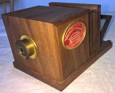 MINIATURE REPLICA OF DAGUERRE'S CAMERA BY JERRY SMITH: Jerry Smith was a camera collector (specializing in early Kodaks) and active for years in the Midwest Camera Historic Society of St. Louis. Jerry had attended the University of Missouri, and was