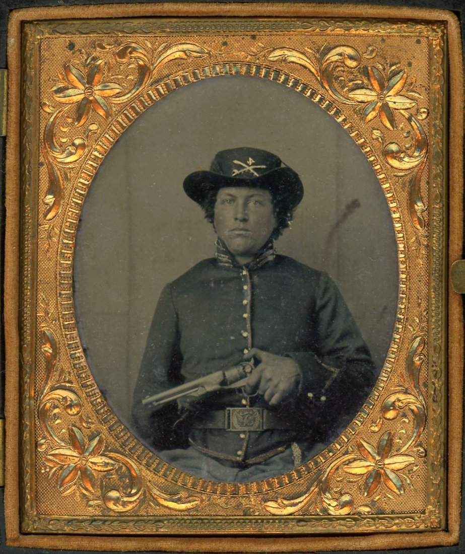 4th CAVALRY SOLDIER & COLT ARMY REVOLVER & ID: Cased Tintype. The '4' on his kepi lets us know he's with the 4th Cavalry. The pistol is a Colt Model 1860 Army revolver of caliber .44, a standard issue weapon for troops of the Civil War. It's not o