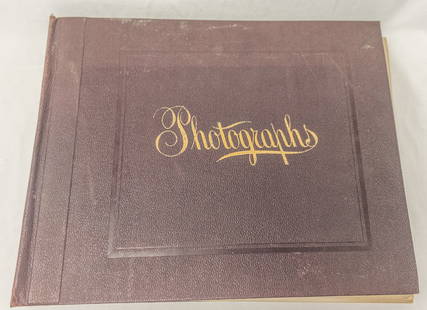 NEW ENGLAND PHOTOGRAPH ALBUM WITH DISASTERS: Photograph album.This album contains 48 images including town views, clocks, rivers with factories, a fire and a flood. It is a fascinating album by an unknown photographer documenting their