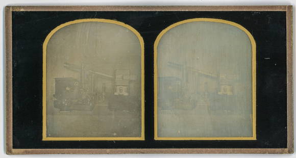 [Stereo Daguerreotype] Alfred and Wright Chadburn: An artistic English stereo daguerreotype in a passe-partout mount of a genre scene of what appears to be a complete daguerreian outfit, including early camera, plate box, and mercury and iodine