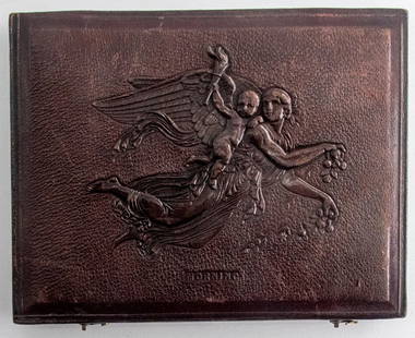 [Unique Daguerreian-Era Leather Photographic Case]: Extremely rare quarter-plate leather case, unlisted in Berg and Nolan references. It is a leather variant of the thermoplastic case produced by John Smith of Birmingham, England, listed in Berg as the