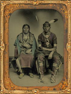 [Tintype] Scarce Portrait of an Osage Couple: Anonymous quarter-plate tintype displayed in a thermoplastic wall frame, ca. 1870s. An exceptionally clear portrait of an Osage couple, both in typical Osage garb -- he with front-seam beaded