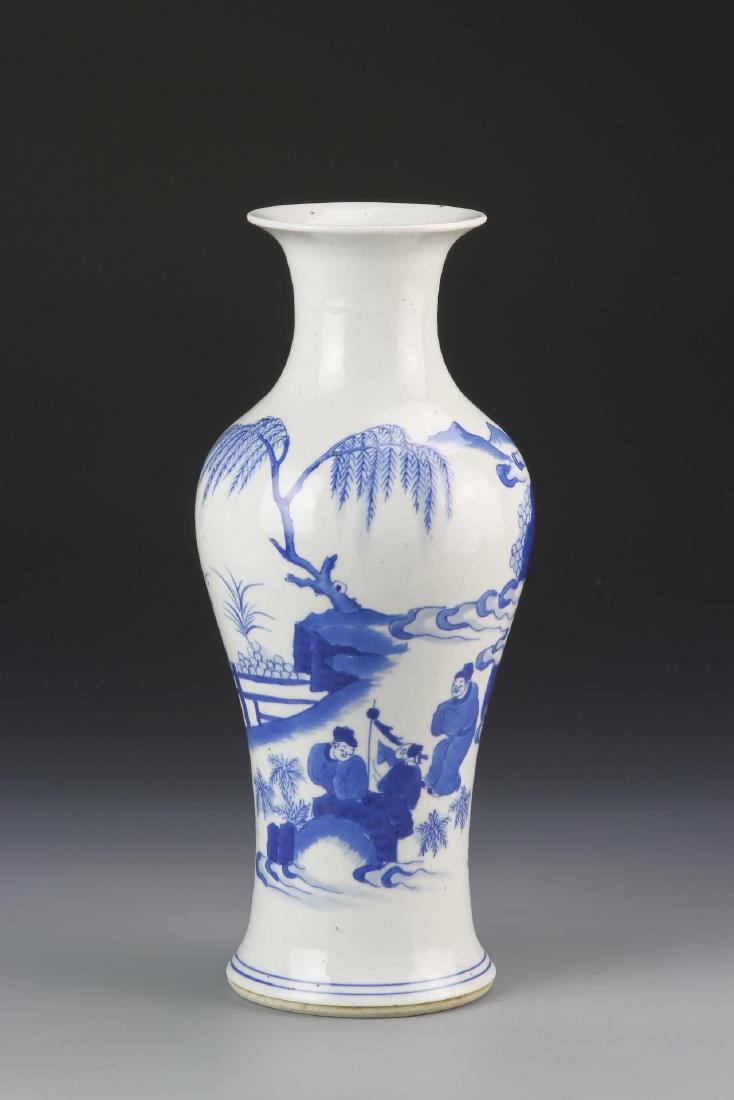 Chinese Blue and White Vase: China, 18th C., blue and white vase, with high, rounded shoulder tapering to the base, flared rim, and detailed motifs of figures in a landscape, double ring mark. Height 10 in.