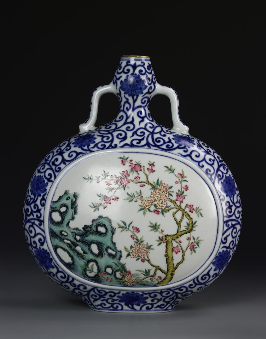 Chinese Blue And White Moon Flask Vase: China, Republic of China, blue and white moon flask vase, famille rose Roundels. 11 1/4 in.