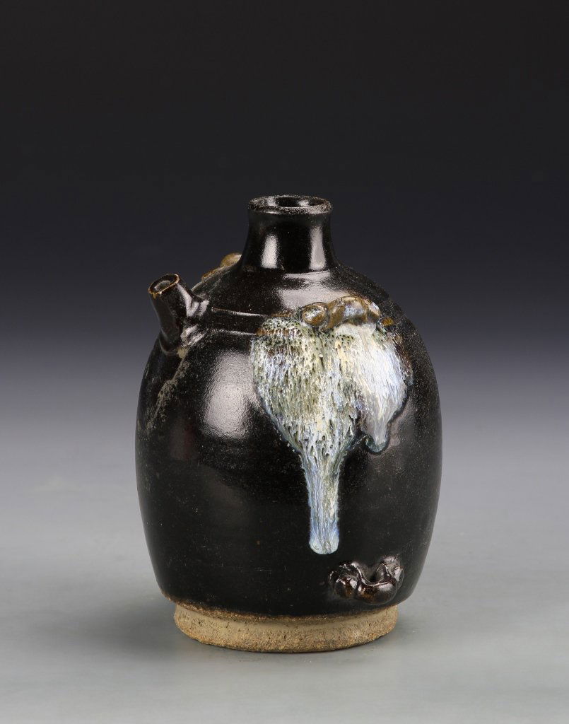 Chinese Ding Yao Ware Wine Pot: China, antique Ding Yao ware wine pot, with rounded body, tapering to the neck, with spout, in a deep black hue, and high shine surface. Height 5 3/4 in.