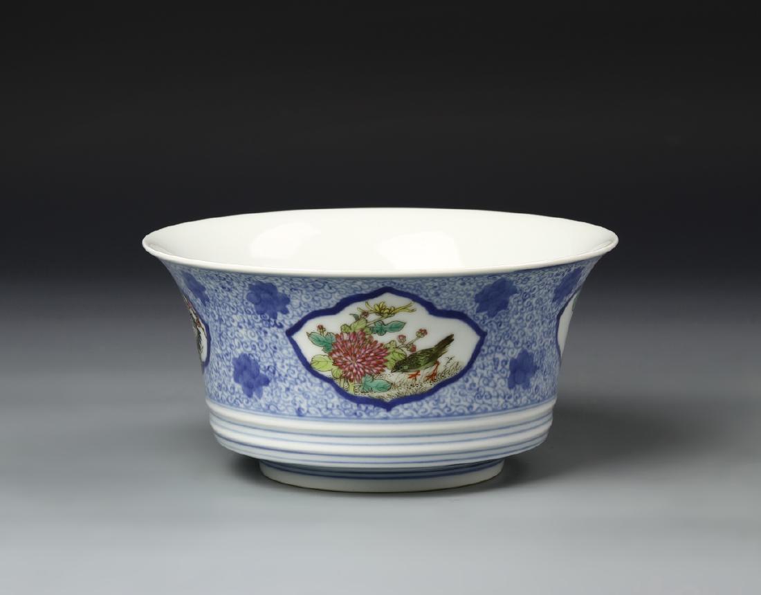 Chinese Blue and White Bowl: China, Qing Dynasty, blue and white bowl, with famille rose roundels decorating the sides depicting birds in floral settings, plain interior, Dao Guang mark on base. Height 3 3/4 in., Width 7 1/2 in._