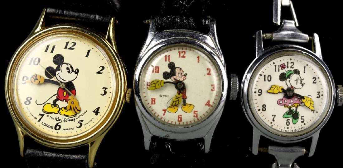 Three Mickey Mouse Watches: Three Mickey Mouse watches. Biggest: 1 in