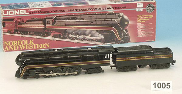 1 LIONEL Replika amerik. Dampflok Nr. 611 der N &: Achsfolge 2'D2', mit 6 achs. Tender, 55 cm, schwarz/rot handlackiert, Lokomotivgehäuse Guß, Tender Blech, neuwertig, im OKT.