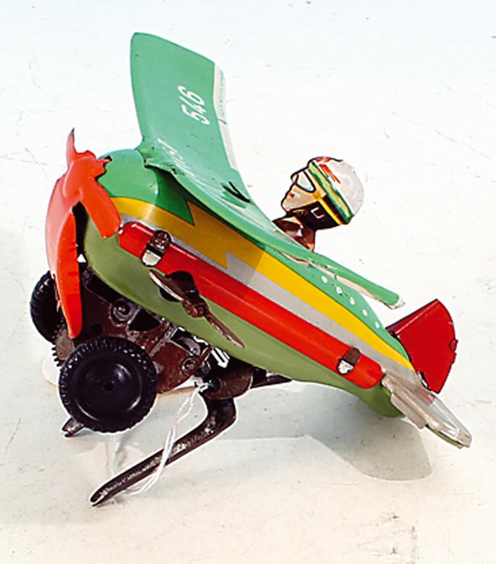 Blech-Flugzeug "Artist" J.G.SCH. 546: Made in Western Germany, mit Uhrwerkantrieb, guter Zustand.