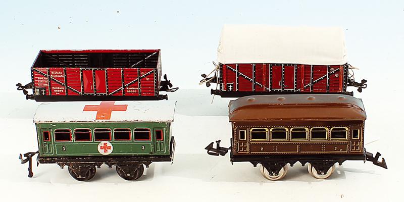 Konvolut Gueter- und Personenwagen, Spur 0: verschiedene Hersteller, Alterungs- und Gebrauchsspuren.