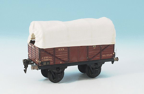MÄRKLIN Planewagen 1663/1: 19,5 cm, braun lithogr., Plane ersetzt, Spriegel original, insgesamt guter Zustand.