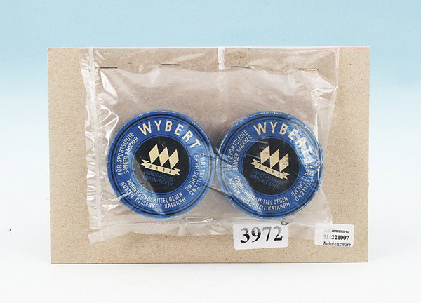 2 WYBERT-Dosen: Durchmesser 6,7 cm, Gebrauchsspuren.