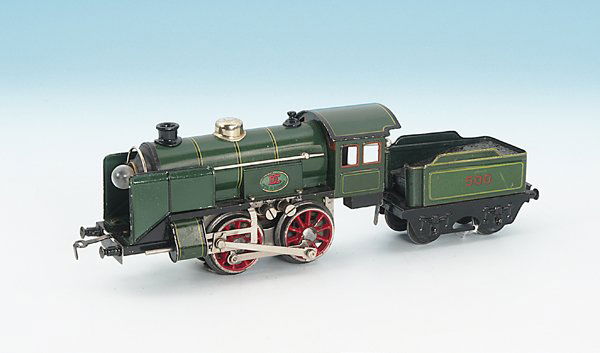 DOLL Dampflok 4/703/0: B, mit 2 achs. Tender, gruen/schwarz lithogr., 32 cm, 20 Volt, guter Orig.-Zustand.