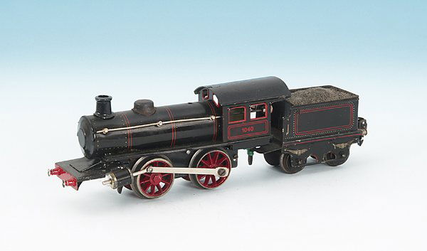 MARKLIN Uhrwerkdampflok R 1040: B, mit 2 achs. Tender, 29 cm, schwarz lithogr., Pfeifimitation auf dem Kessel fehlt, ansonsten nur leichte Gebrauchsspuren.