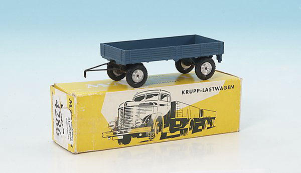 MÄRKLIN KRUPP-Lastzug 8009: neuwertig, im OKT, dazu der passende Anhänger ohne OKT