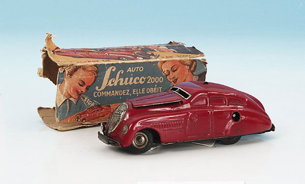 SCHUCO Komando 2000: 14 cm, rot, handlackiert, leichte Gebrauchsspuren, in beschädigtem französischen Originalkarton.