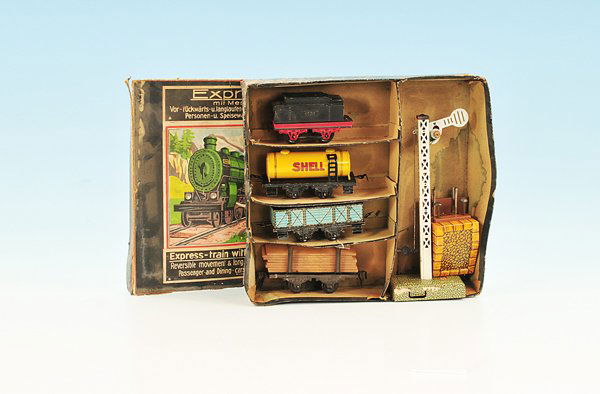 SCHUHMANN Zugpackung: Inhalt: Tender, 3 Güterwagen, Signal und Prellbock, Bestückung nicht original, Besichtigung erforderlich.