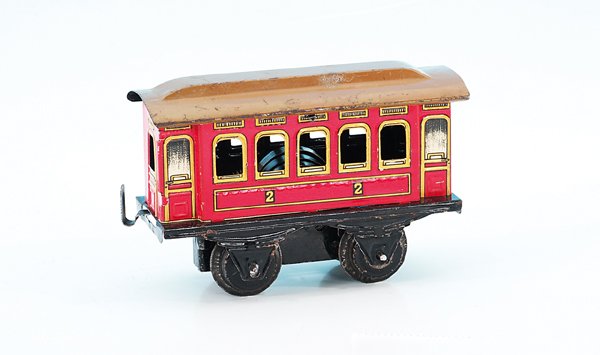 KBN Straßenbahn-Motorwagen - Uhrwerk -: Länge 11,5 cm, rot lithogr., Dach braun handlackiert, minimale Gebrauchsspuren.