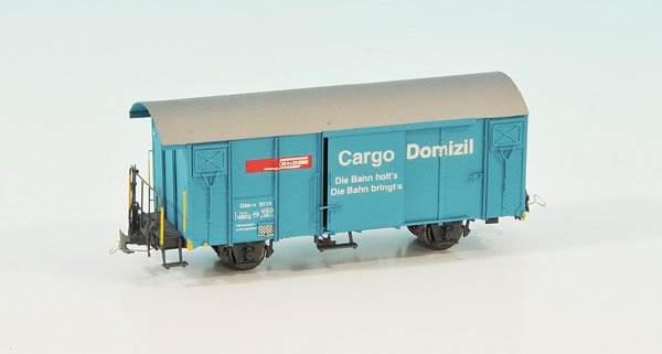Gepäckwagen der RHB, Spur 0m: 18 cm, blau, Dach silbern, Metallausführung, guter Zustand.