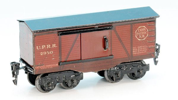 MÄRKLIN amerik. Güterwagen 2950/0: 16,5 cm, braun lithogr., Dach schwarz handlackiert, Blechspeichenräder, guter Orig.-Zustand, leichte Gebrauchsspuren. In dieser Ausführung eine Rarität!
