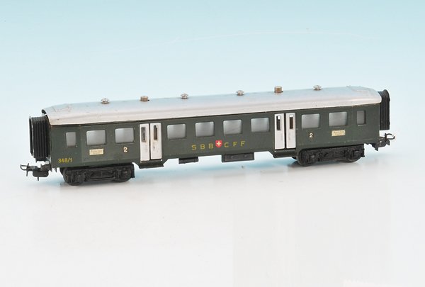 MÄRKLIN schweizer Drehtürenwagen 348/1.1: Blech, Gussdrehgestelle, seltene Version mit seitlich geklammertem Dach, einige Alterungs- und Gebrauchsspuren, Rarität!