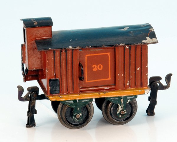 MÃ„RKLIN gedeckter GÃ¼terwagen 1804/0: 10 cm, rotbraun, Dach schwarz, Hakenkupplungen, deutliche Gebrauchsspuren rundum.