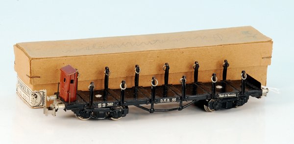 MÃ„RKLIN Rungenwagen 392.2: Blech, KK 3, alle Rungen vorhanden, sehr guter Orig.-Zustand, im OKT mit Kinderkopf-Etikett.