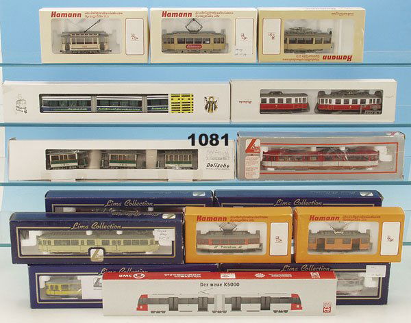 1 Konvolut Strassenbahnen, Spur H0: LIMA, HAMANN, u.a., 15 Packungen, neuwertig, in OKTs.