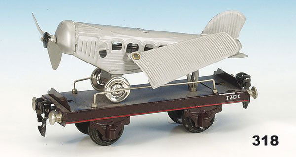 1 PAYA Flugzeugtransportwagen: 2 achs., 17 cm, beladen mit Flugzeug, guter Zustand.