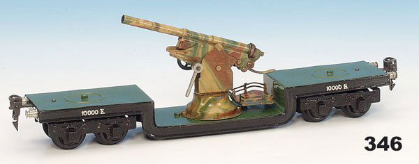 1 MARKLIN Flakwagen 1955/0 G: 4 achs., 31 cm, Unterwagen teilweise neulackiert, Geschütz mit Verschluss, Mimikry, guter Orig.-Zustand.