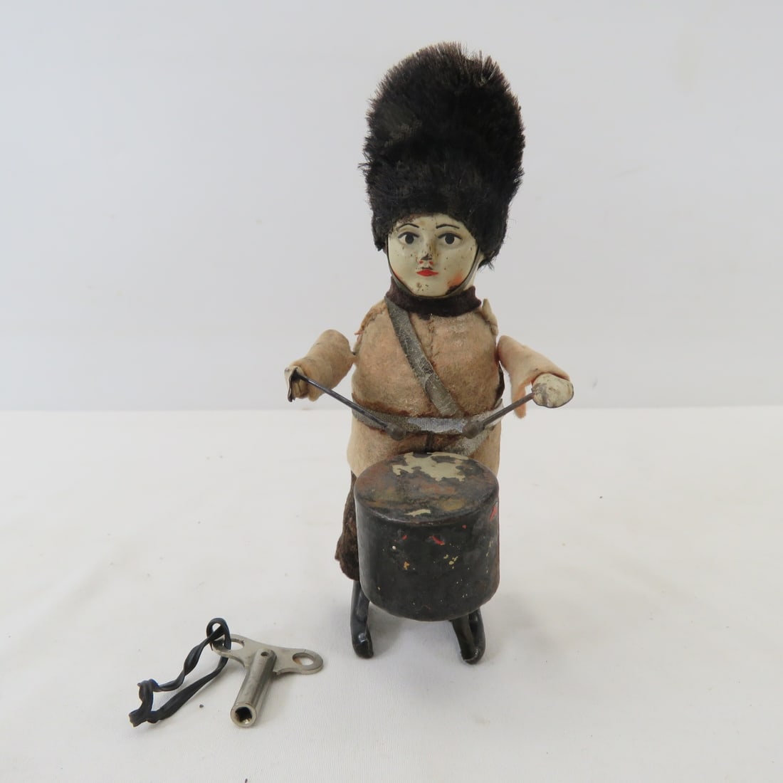 Antique German Schuco Key Wind Soldier Drummer: with key, mohair hat.- works All antique items have wear consistent with age please review all photos, and please read terms & conditions and ask questions before bidding.