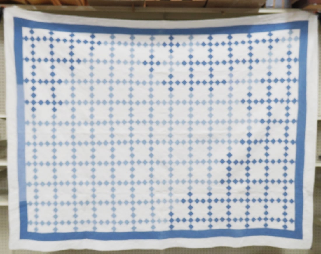 Antique Nine Patch Hand Stitched Quilt 84 x 64": blue & white, faded, light stain on the back. All antique items have wear consistent with age please review all photos, and please read terms & conditions and ask questions before bidding.