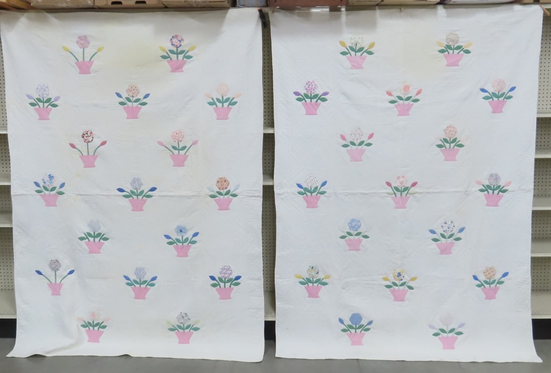 2 Applique Folk Art Flower Basket Quilts 90x64": some spots need cleaning All antique items have wear consistent with age please review all photos, and please read terms & conditions and ask questions before bidding.