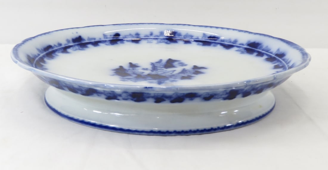 Chinese Flow Blue Footed Cake Platter: 12" pedestal platter, can't read mark All antique items have wear consistent with age please review all photos, and please read terms & conditions and ask questions before bidding.