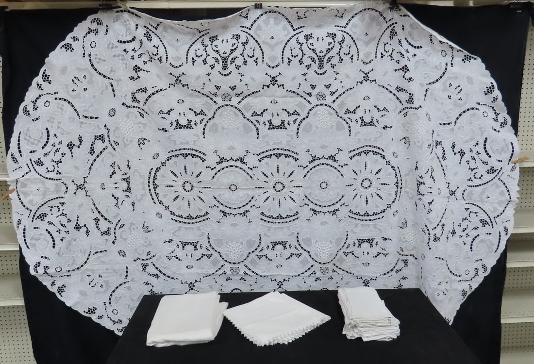 2 Hand Worked Tablecloths and Napkins: 1. 66x98 Battenberg lace oval tablecloth with stains, 2. 68x100 sheer embroidered tablecloth. 3. set of twelve dinner napkins, 4. set of eight lace edge napkins, somestaining, All antique items have w