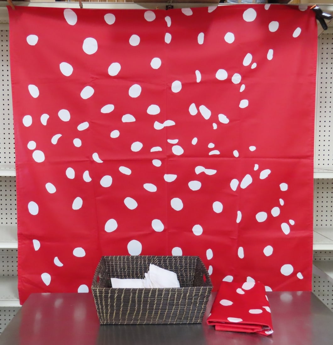 2 Marimekko Tablecloths, 18 Napkins & Basket: 2 red and white oil cloth Finnish tablecloths marked Marimekko oyj suomi-Finland Hennamari Asunta 2007 "Pilkku" 53x53, basket is 15x18x6", and 18 white napkins from "World Market- some stains All anti