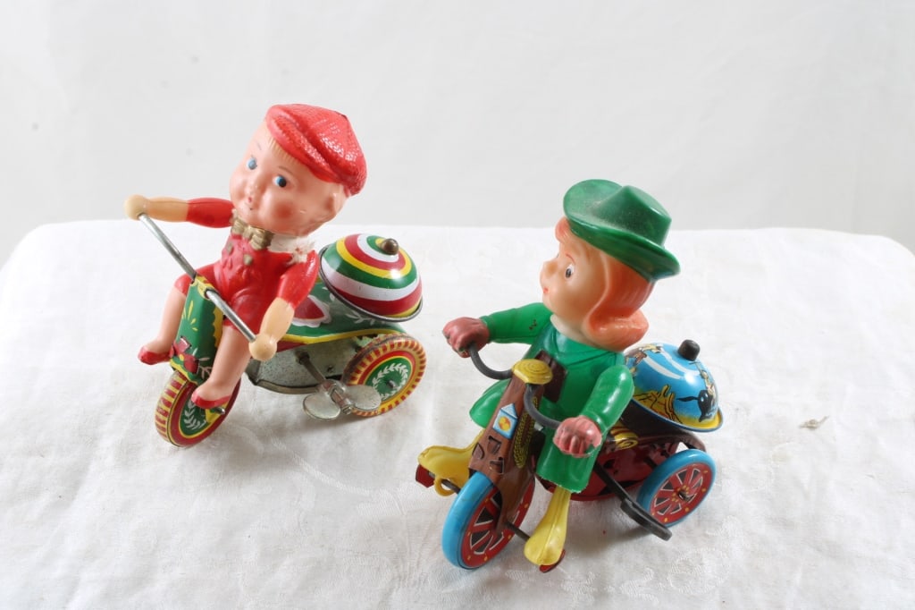 2 Wind Up Tin Toys Marx Cowgirl on Trike & Boy: 2 Wind Up Tin Toys Marx Cowgirl on Trike & Boy- Both toys work, the Cowgirl is made by Marx Celluloid Cowgirl tin trike, and the boy on trike is made in China. As pictured. Please ask questions and re